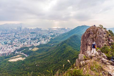Visit the New Territories between the Kowloon hills and the boundary with mainland China