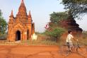 Boy cycling near Bagan, Myanmar