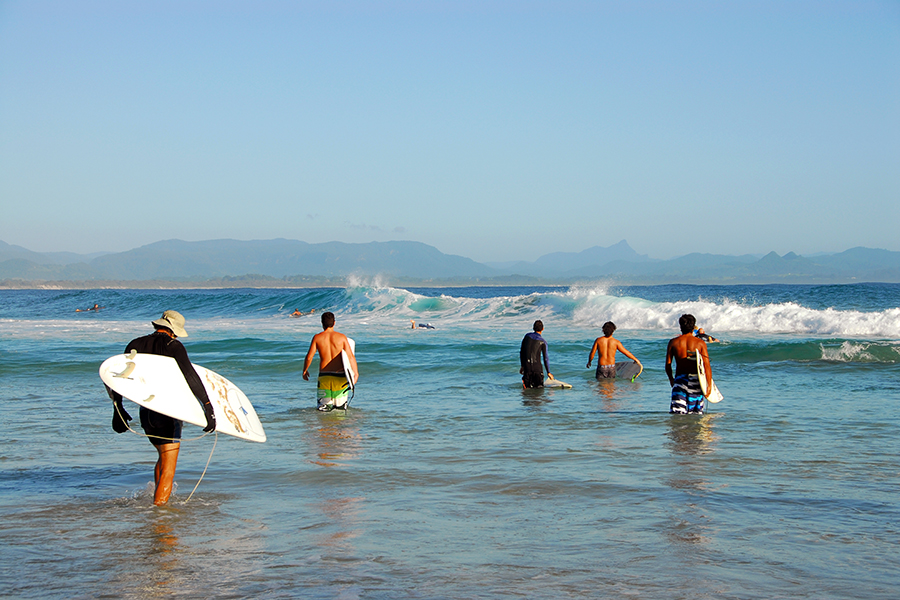 Surfers at Byron Bay, New South Wales, Australia