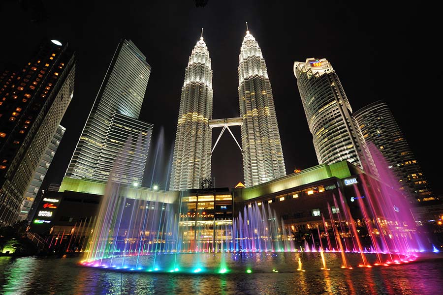 A nightime view of Kuala Lumpur and the Petronas Towers