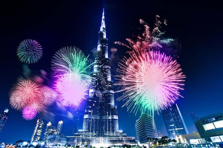 The Burj Al Kalifa, Dubai at night with fireworks filling the sky