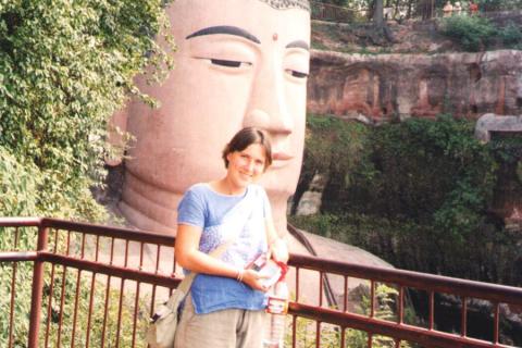Lien standing by the giant buddha | China