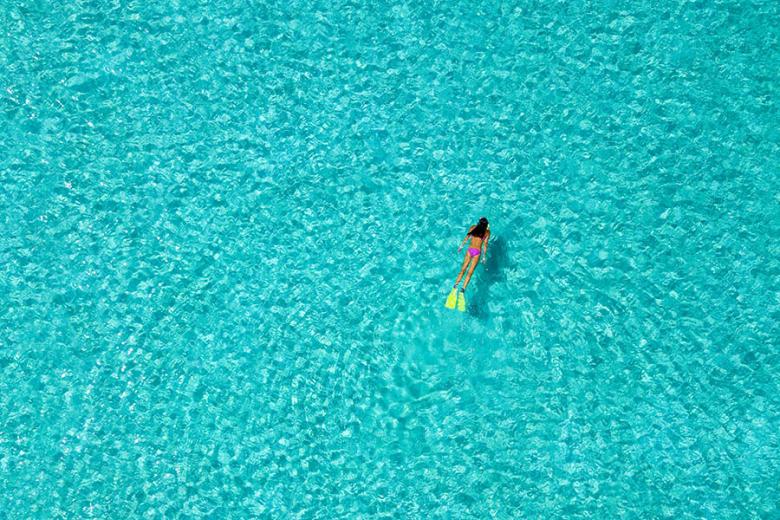 Snorkel through Aitutaki's clear lagoon | Travel Nation