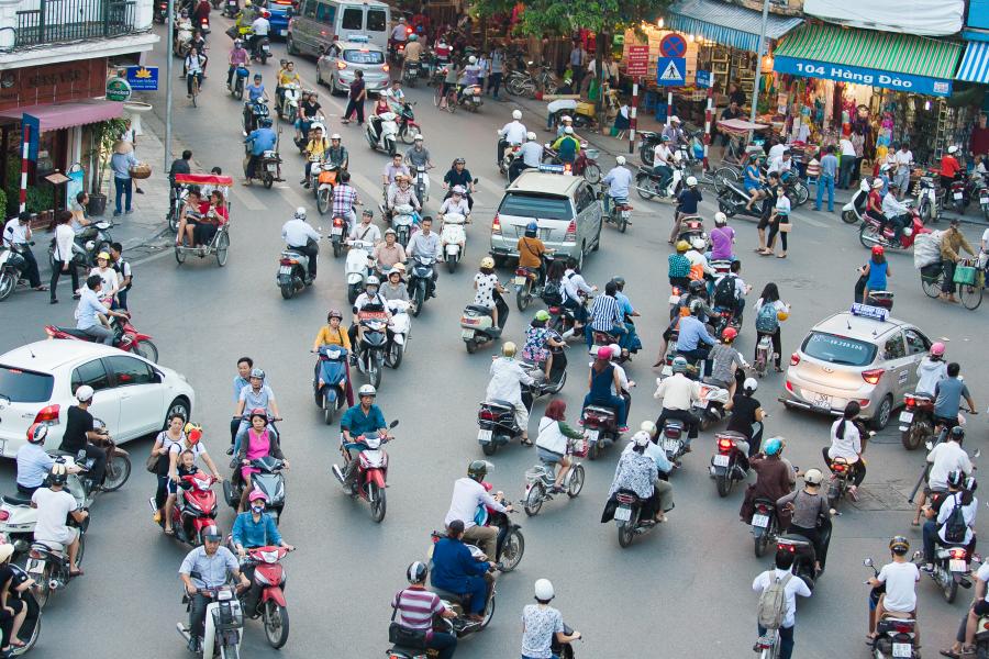 Explore the moped filled streets of Hanoi